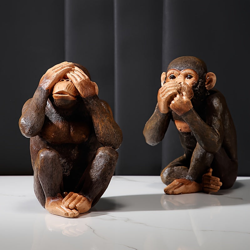 Vrolijke chimpansee set, realistisch en duurzaam, een eyecatcher in elk interieur of tuin.