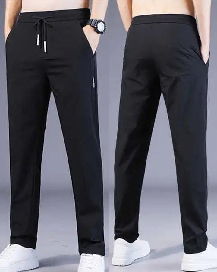 Grijze AeroFlex casual herenbroek, stretch en sneldrogend, comfortabel voor outdoor avonturen en dagelijks gebruik.