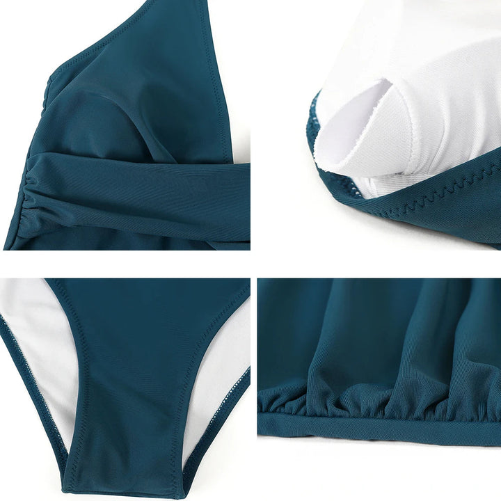 Dames eenstuk zwempak met push-up, open rug en elegant ruche detail.