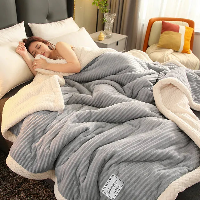 De CozyCuddle Luxe Winter Fleece Deken, voor ongeëvenaarde warmte en comfort thuis.