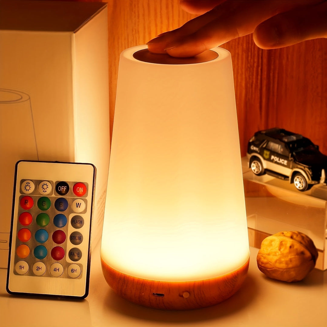 Stijlvolle draadloze RGB touchlamp, USB oplaadbaar, ideaal als dimbaar bedlampje.