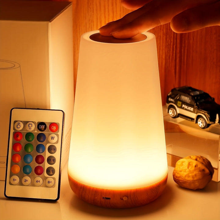 Stijlvolle draadloze RGB touchlamp, USB oplaadbaar, ideaal als dimbaar bedlampje.