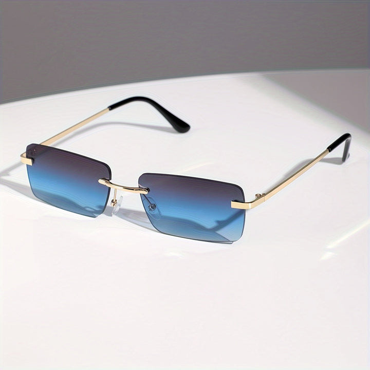 Stijlvolle frameloze heren zonnebril, trendy design, comfortabel en met UV-bescherming. Perfect voor de zomer.