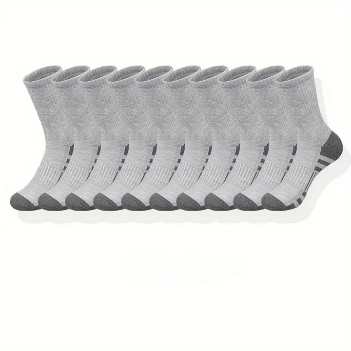 Close-up van antislipzolen op duurzame herensportsokken, voor extra grip tijdens hardlopen en basketbal.