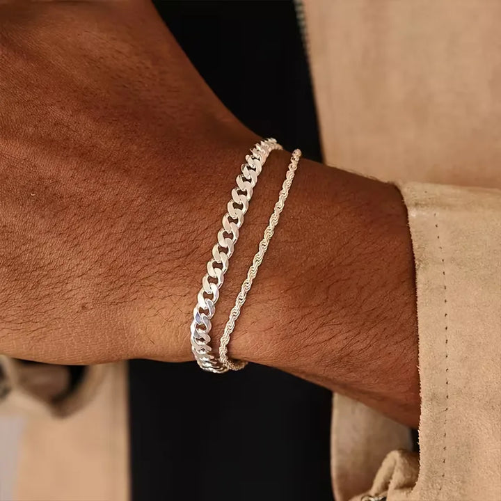 Zilveren & gouden heren armbanden set: Cuban Link schakelarmband en Rope Chain touwarmband. Stijlvolle modeaccessoires.