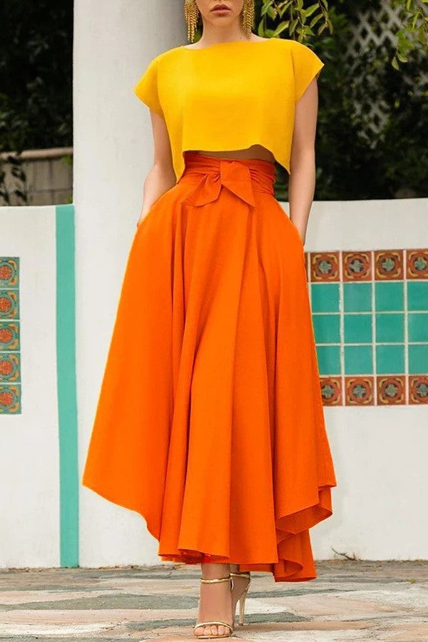 Hoymans damesrok: rode A-lijn zomerrok met hoge taille en stijlvol strikdetail, een elegante keuze.