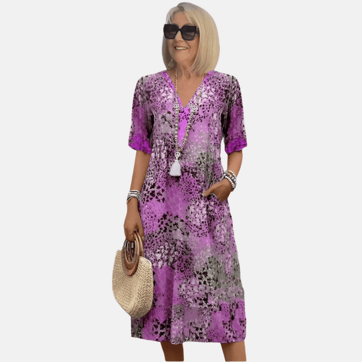 Comfortabele dames vintage A-lijn zomerjurk met V-hals en unieke 3D-print. Losse pasvorm, knielengte.