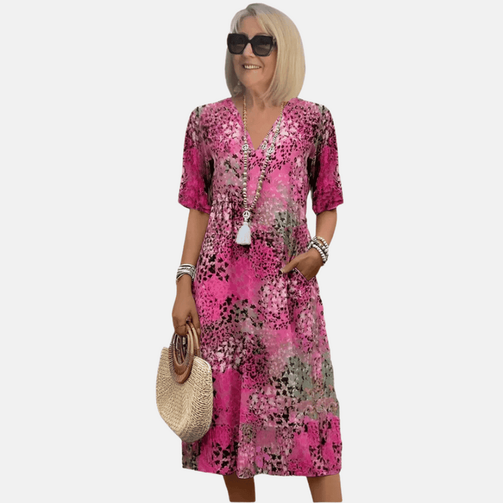 Retro dames zomerjurk met losse pasvorm, V-hals en unieke 3D-print. Comfortabele knielengte jurk voor de zomer.