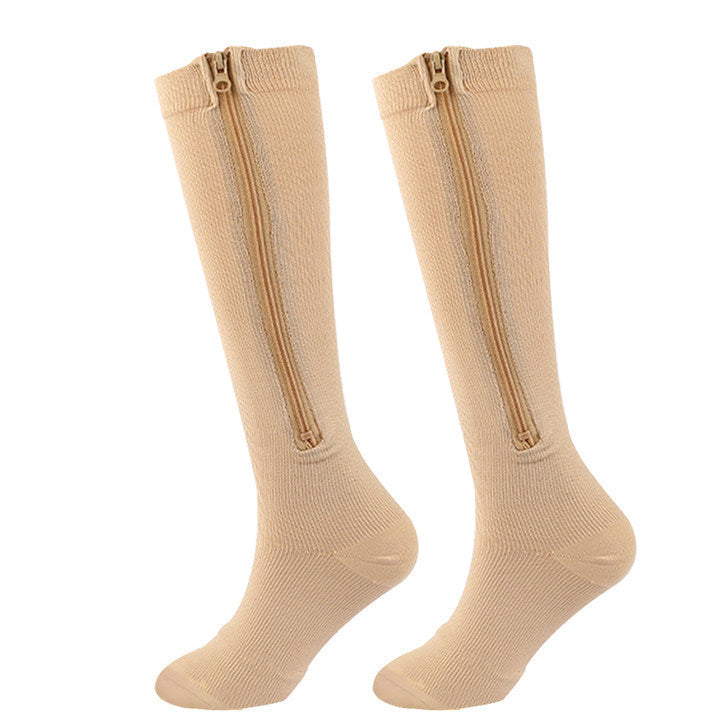 Unisex compressiekousen met rits voor gemakkelijke beenverlichting en verbeterde bloedsomloop. Ideaal tegen zwelling.