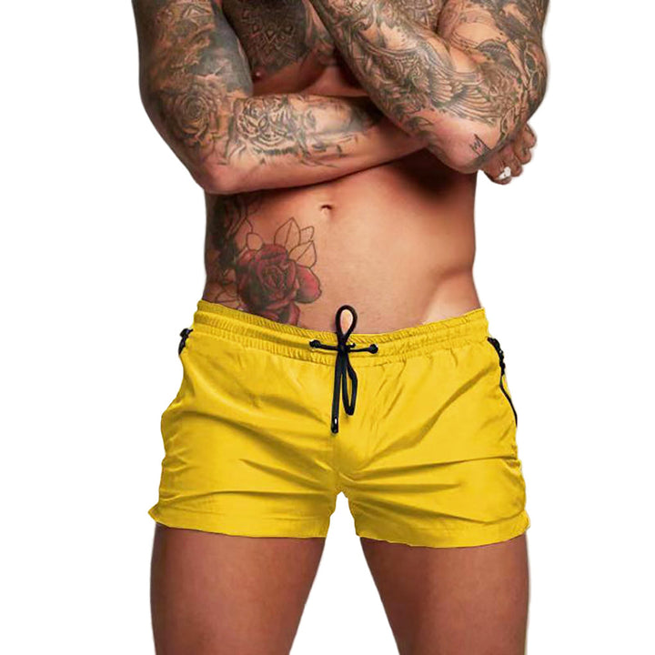Elastische tailleband van de heren zwemshorts, biedt comfort en bewegingsvrijheid tijdens het zwemmen.