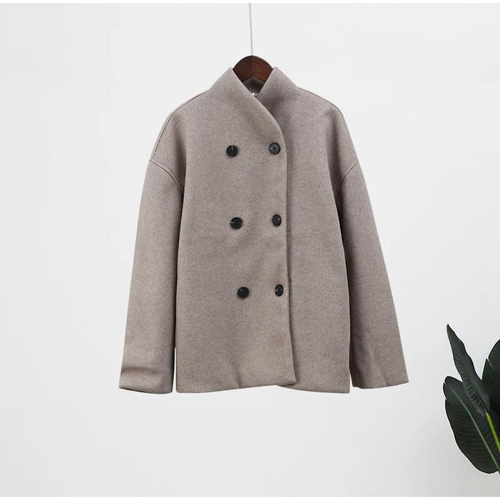 Modieuze winterjas dames, losse pasvorm, elegant en warm, ideaal outwear item.