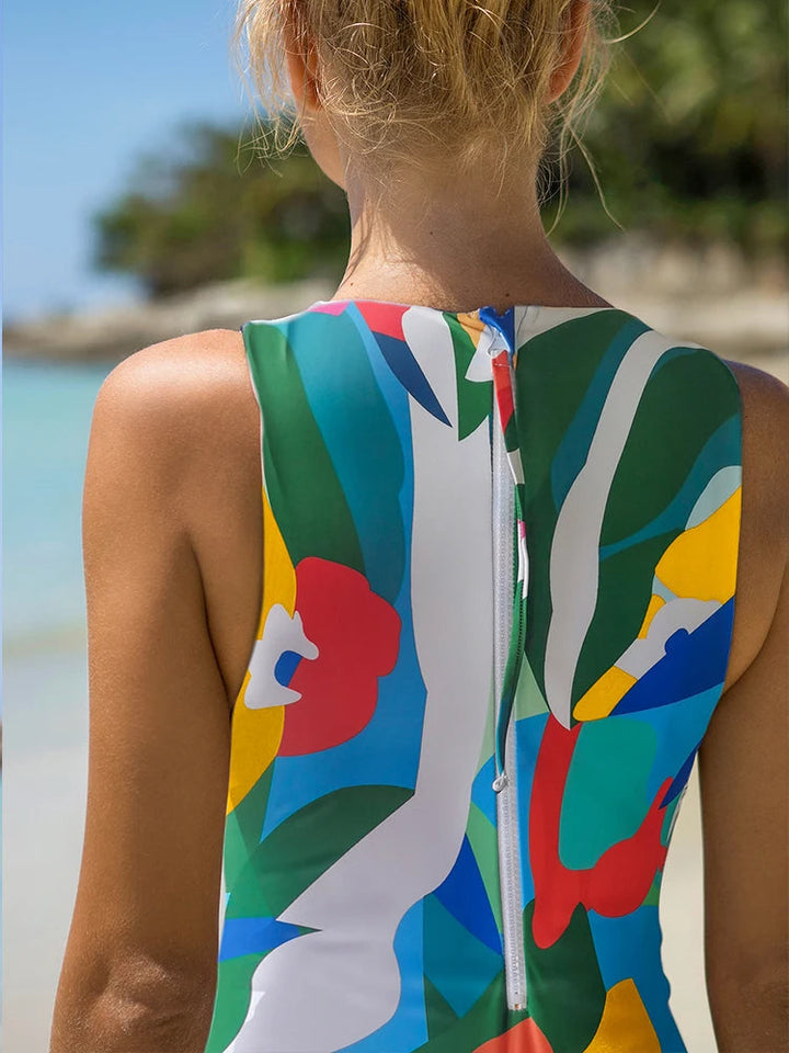 Retro push-up dames badpak met levendige kleurrijke print en ritssluiting voor een flatterend silhouet.