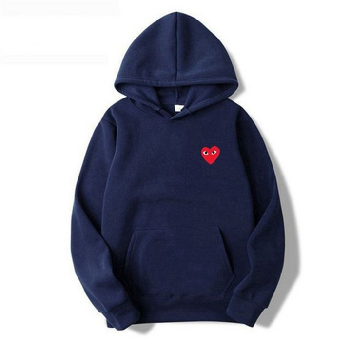 Veelzijdige unisex hoodie, geschikt voor alle seizoenen en diverse casual outfits.