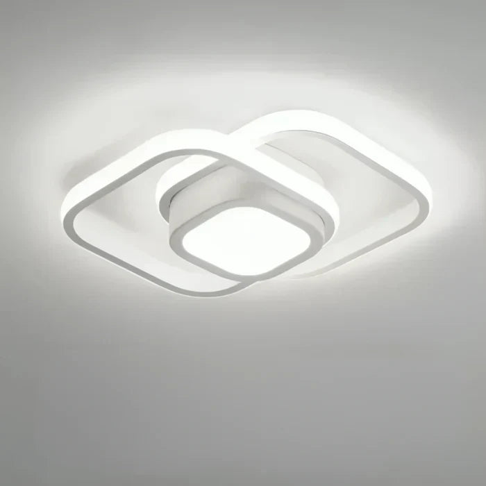 Trendy LED ringlamp 'Twilight Rings' voor een moderne inrichting. Dubbele cirkels, warm wit licht.