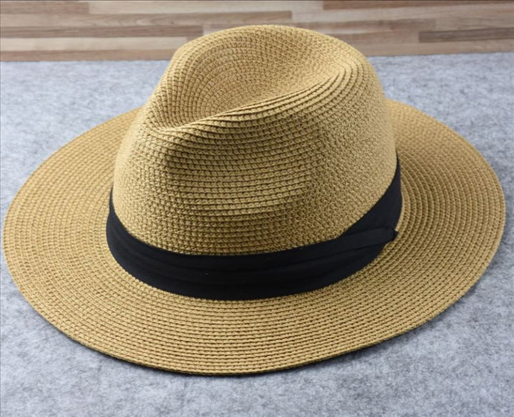 Chique dames strohoed, de ideale zomeraccessoire die elegantie combineert met effectieve zonbescherming.