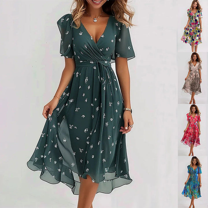 Trendy dames midi jurk met bloemenprint, perfect voor een stijlvolle lentelook. Comfortabel en modieus.
