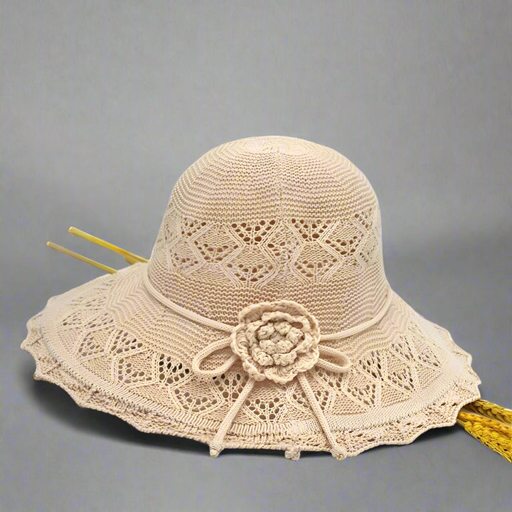 Stijlvolle dames zonnehoed (beige, koffie, grijs) met brede rand en UV-bescherming. Ademend en elegant zomer accessoire.