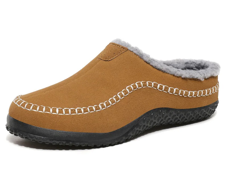 Luxe en warme herenpantoffels; zachte materialen en een stevige antislipzool.