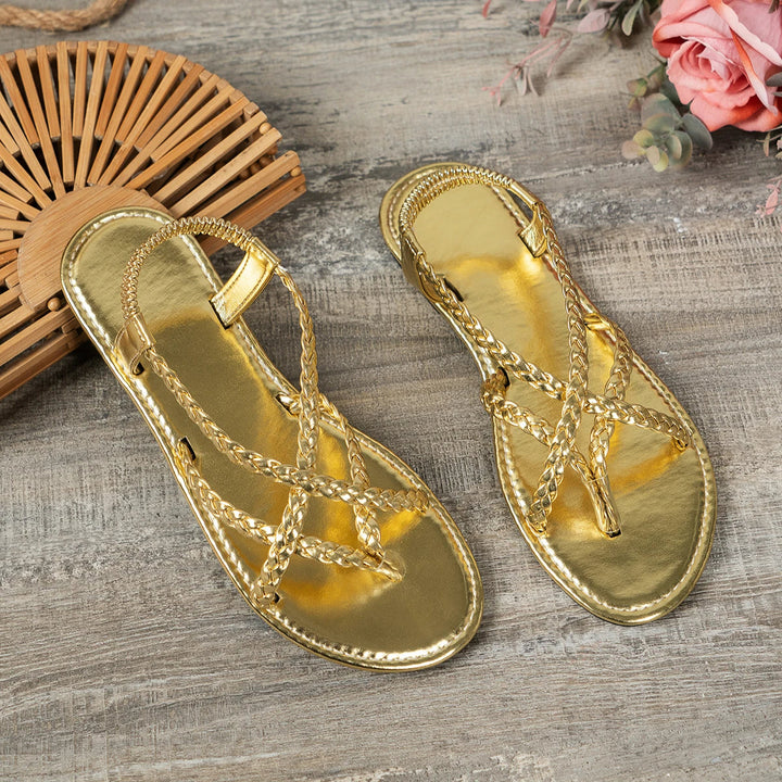 Modieuze Hoymans dames slippers, gevlochten band, platte zool, perfect voor casual outfits.