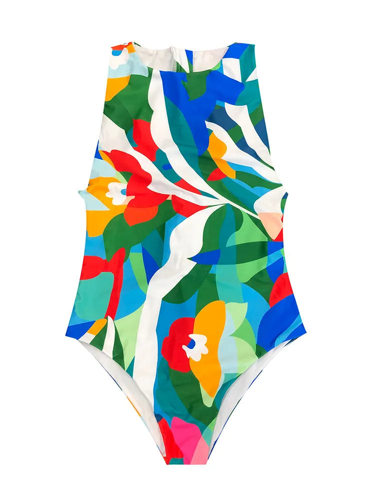 Trendy retro badpak voor dames met opvallende kleurrijke print en praktische ritssluiting aan de voorzijde.