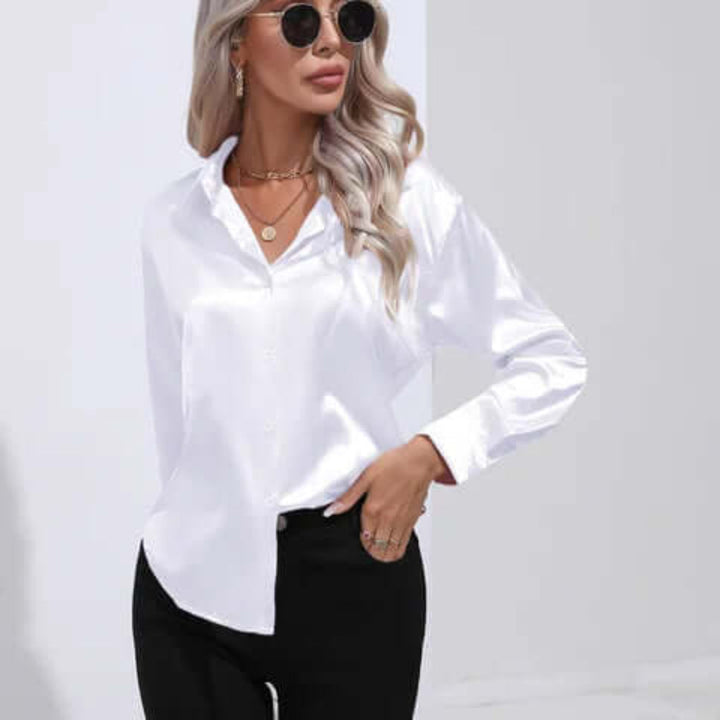 Stijlvolle damesblouse met comfortabele losse pasvorm, lange mouwen. Perfect voor moderne damesmode.