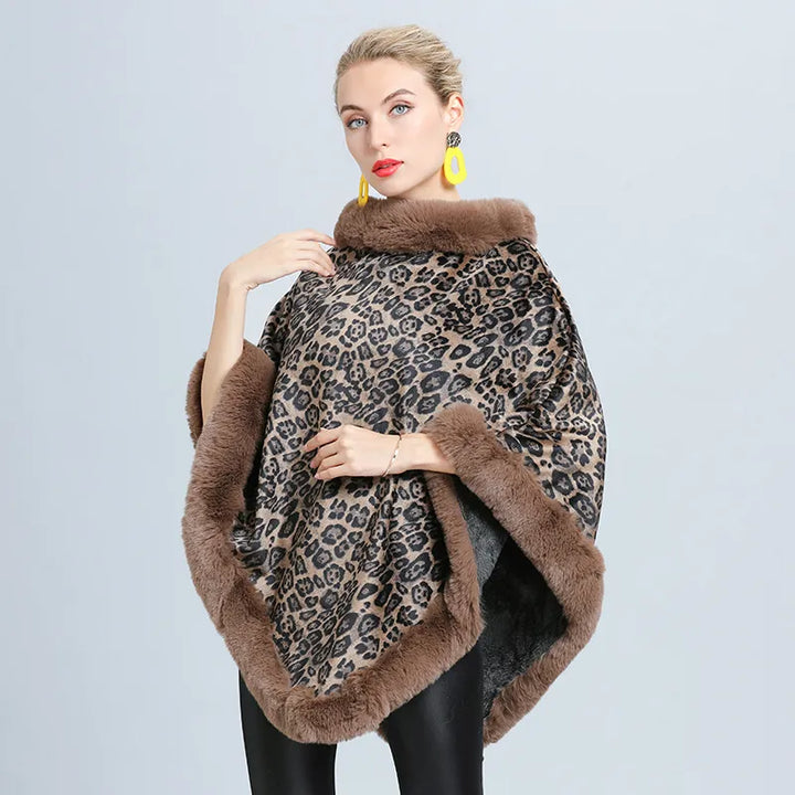 Comfortabele gebreide damesponcho trui, elegante snit en warme stof, ideaal voor koudere dagen.