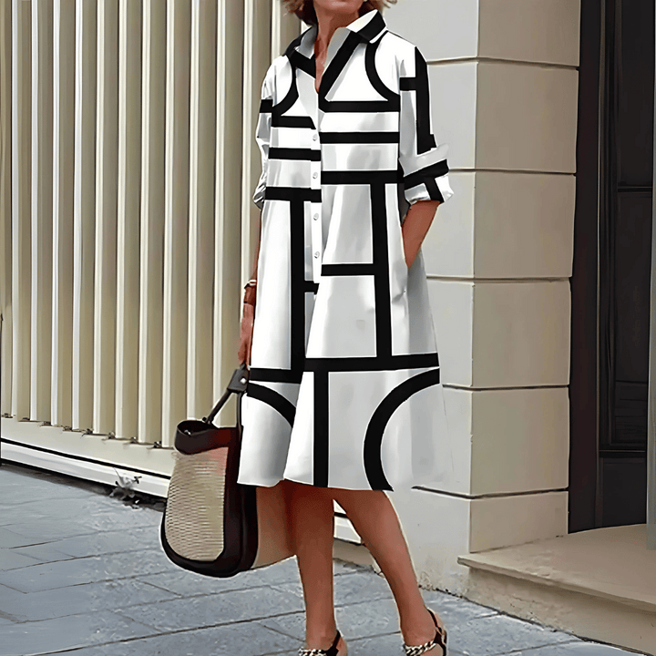 Dames overhemdjurkje met geometrische print. Moderne casual zomerjurk met knoopsluiting, ideaal voor elke gelegenheid.