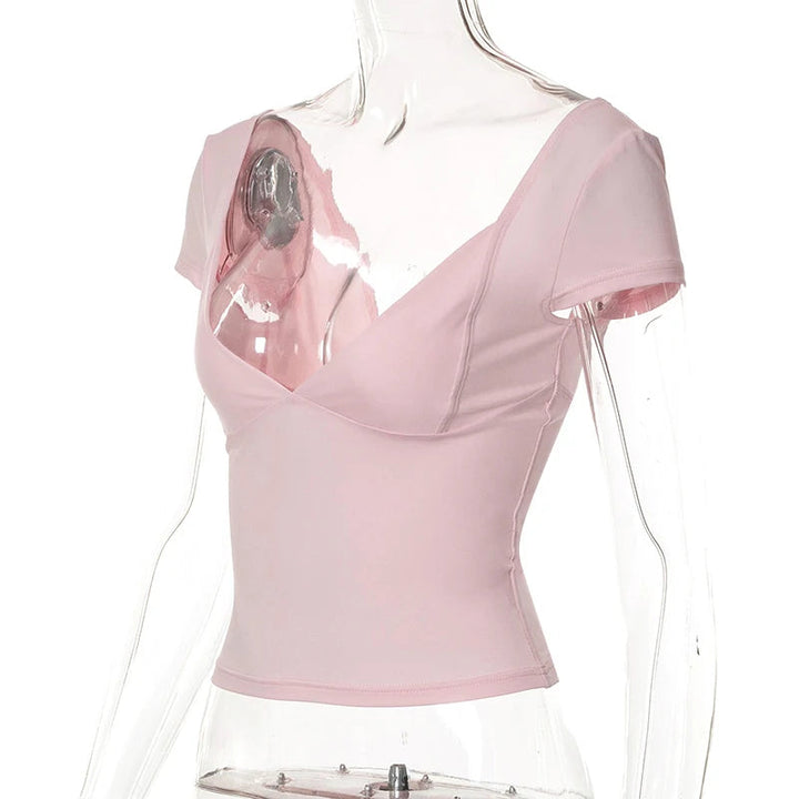 Trendy dames t-shirt met V-hals, slim fit pasvorm die het figuur flatteert.