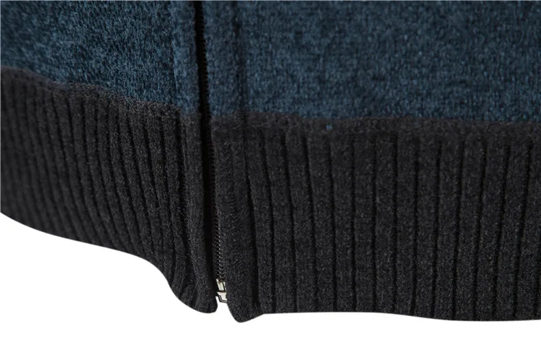 Close-up van de gebreide stof van het warme heren vest, perfect voor winterse comfort.