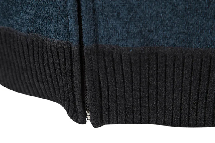 Close-up van de gebreide stof van het warme heren vest, perfect voor winterse comfort.