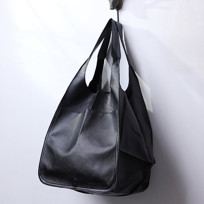 Oversized dames tas in vintage stijl, ideaal als dagelijkse tas en elegant accessoire.