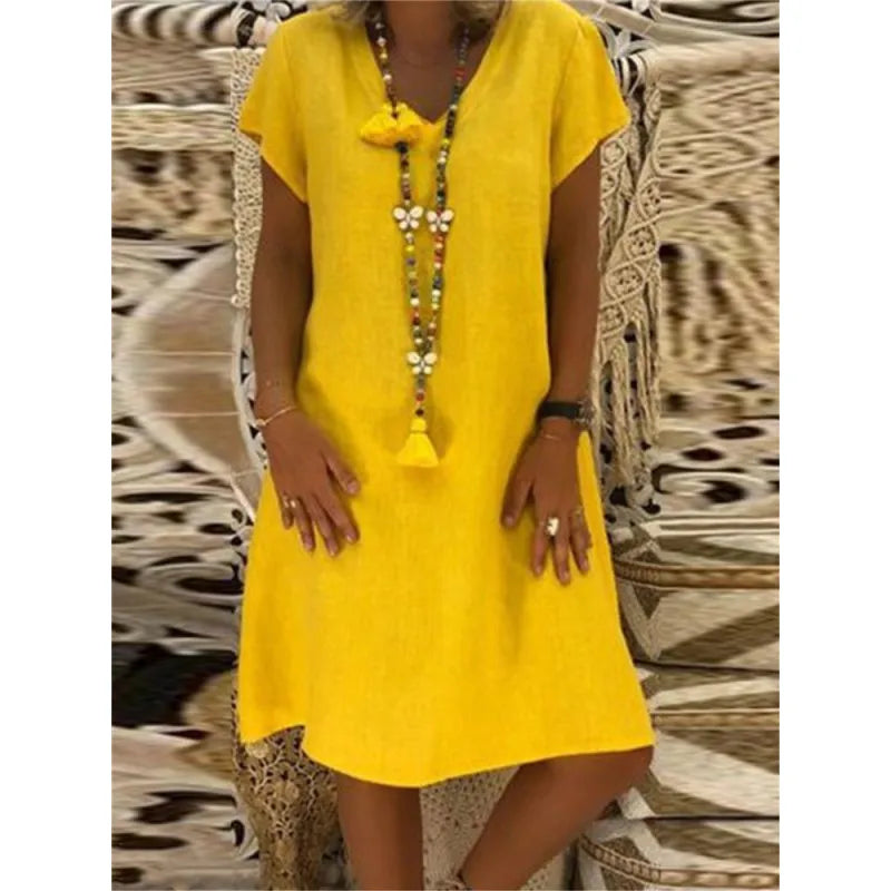 Midi-jurk voor dames met V-hals en korte kapmouwen. Casual elegante zomerjurk, perfect voor warm weer.