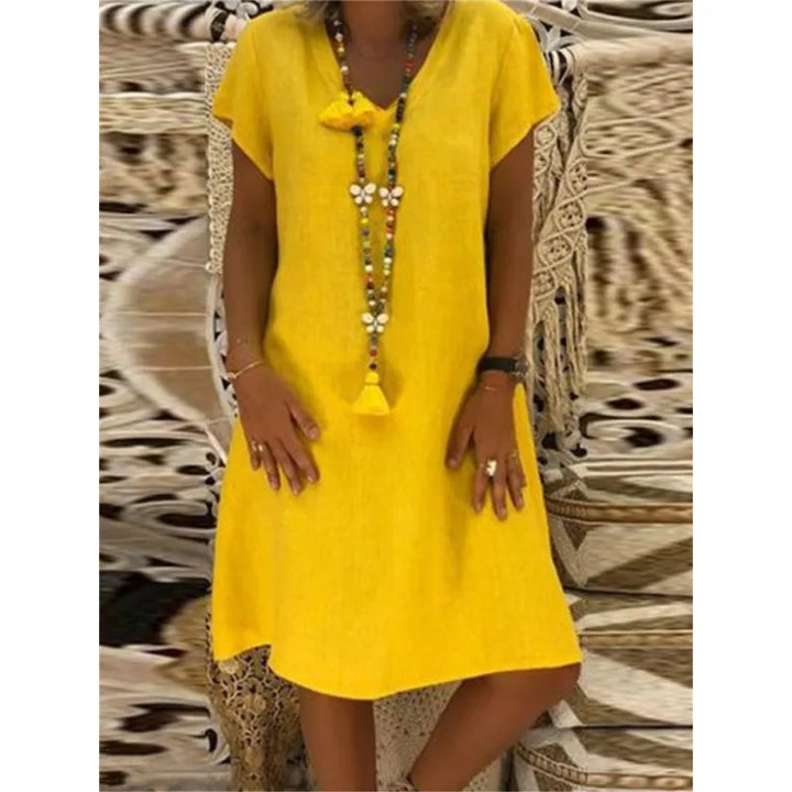 Midi-jurk voor dames met V-hals en korte kapmouwen. Casual elegante zomerjurk, perfect voor warm weer.