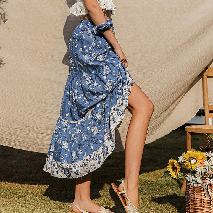 Comfortabele vloeiende damesrok met bloemenprint, hoge taille en midi lengte voor casual elegantie.