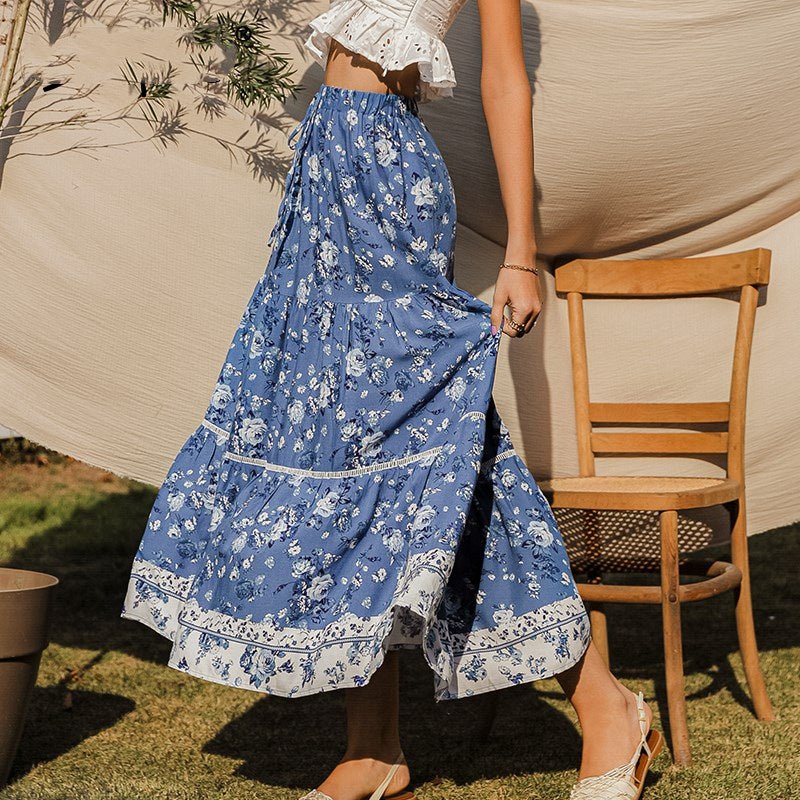 Elegante casual midirok met bloemenprint en hoge taille, ideaal voor zomerse dagen.