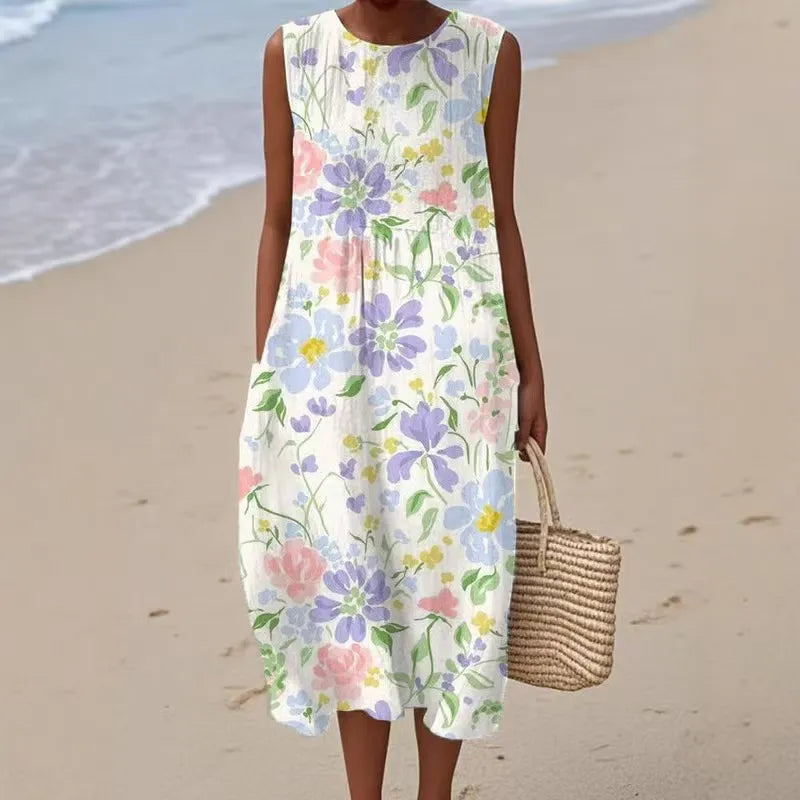 Witte mouwloze dames midi zomerjurk voor casual comfort en stijl op warme dagen of vakantie.