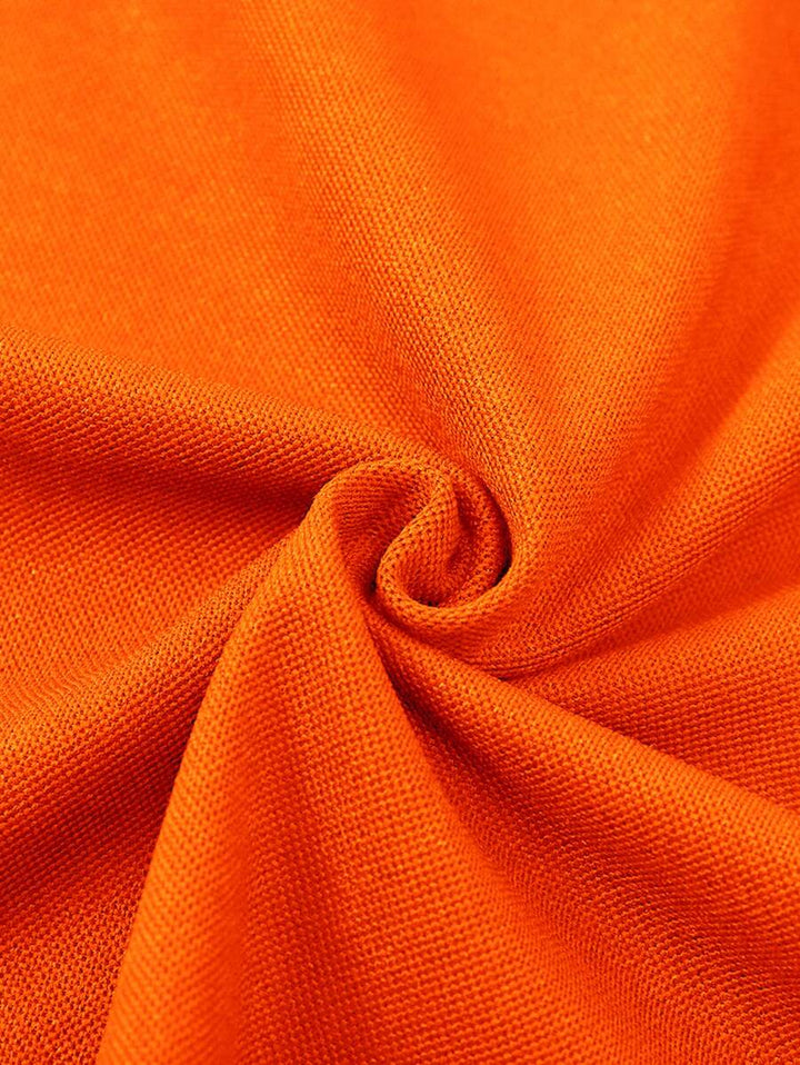 Comfortabel oranje heren T-shirt met korte mouw en knoopsluiting. Slim fit, ideaal voor zomerse casual stijl.