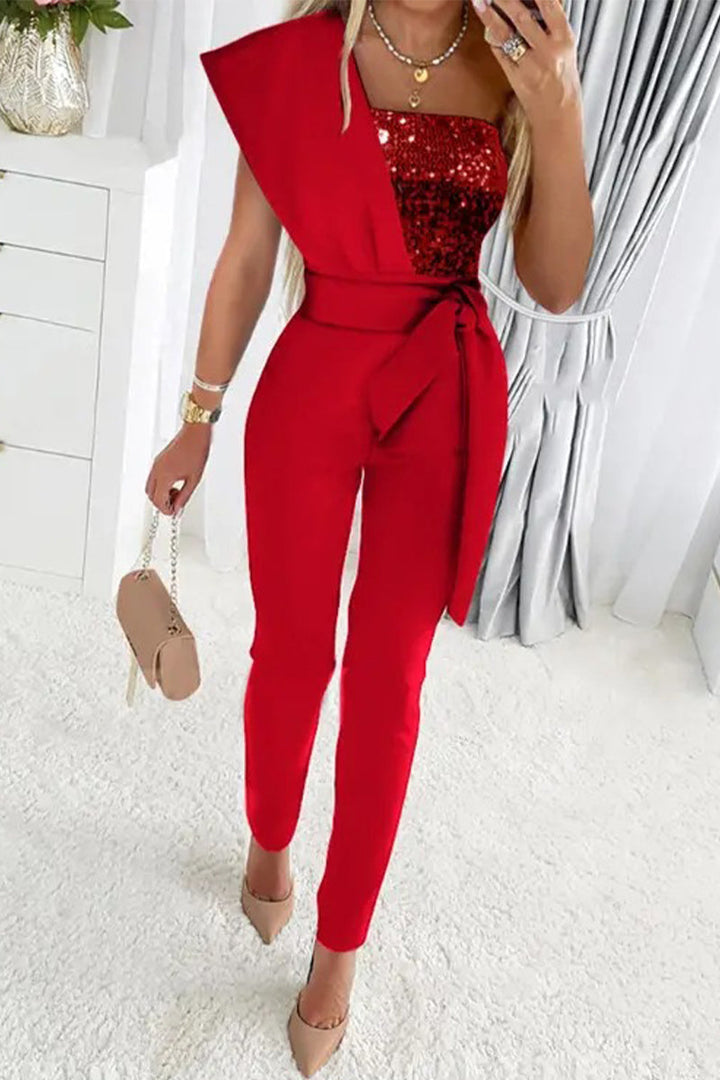 Chique asymmetrische glitter jumpsuit voor dames, stijlvolle feestkleding en avondmode. Nieuw in de collectie.
