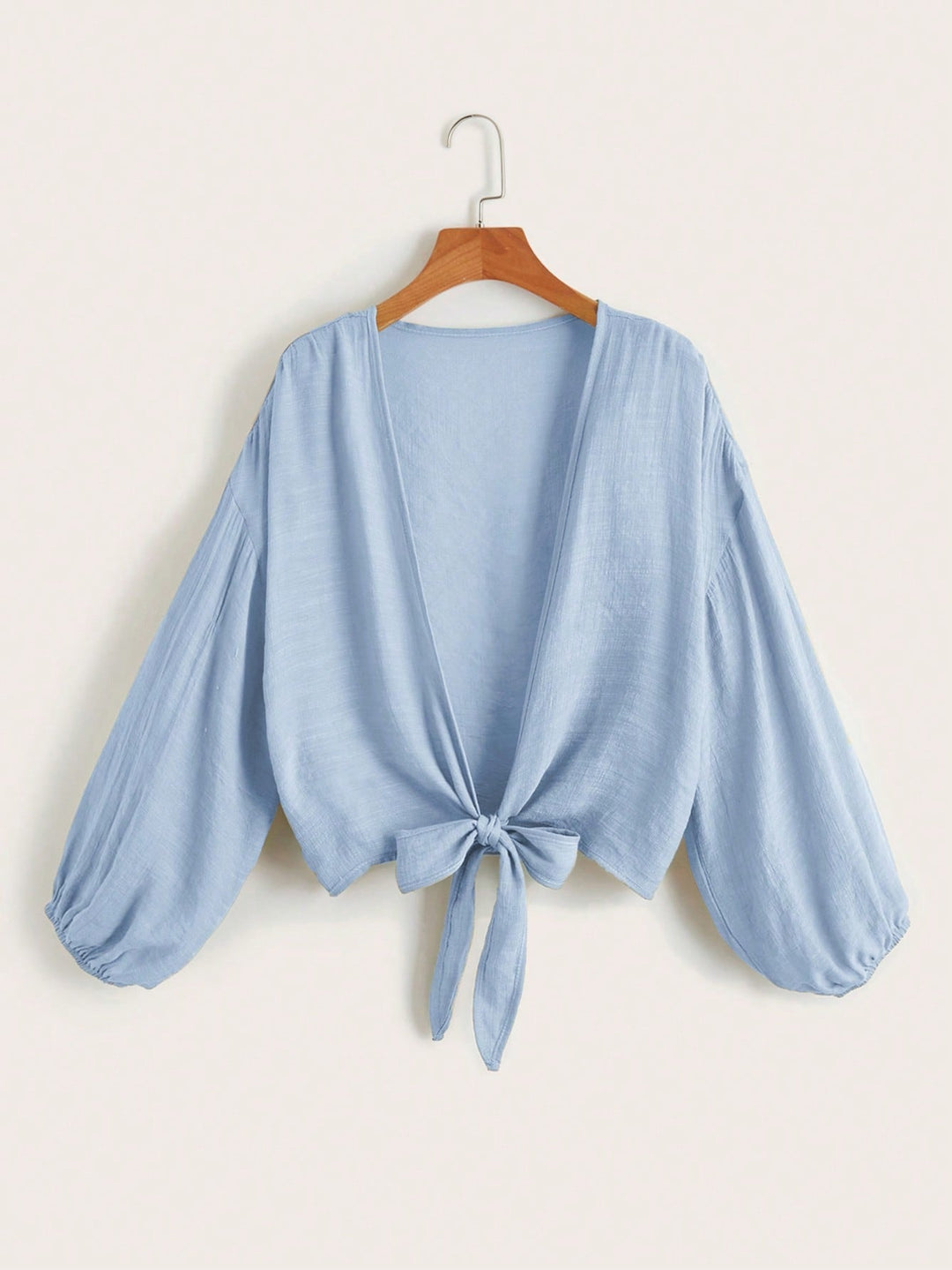 Boho-stijl dames kimono met strik, elegant en luchtig voor warme dagen.