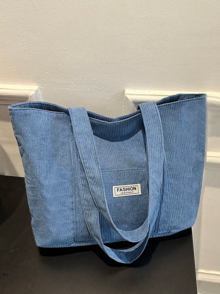 Casual corduroy tote bag met veel ruimte, perfect als schooltas voor studenten.