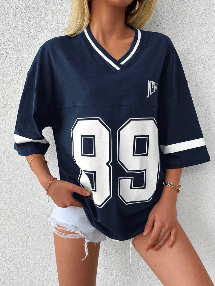 Zwart oversized baseball shirt voor dames. Casual, comfortabel en trendy voor een relaxte streetwear stijl.
