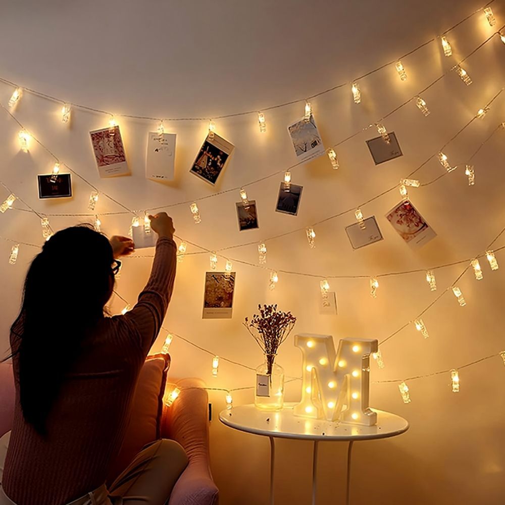 Sfeervolle LED fotolamp met clips voor persoonlijke decoratie. Warme fotoslinger met herinneringen.
