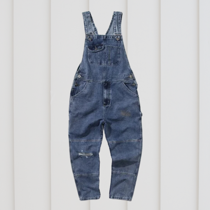 Blauwe unisex werkkleding tuinbroek, duurzaam en ideaal voor buitenwerk. Comfortabel en functioneel met meerdere zakken.