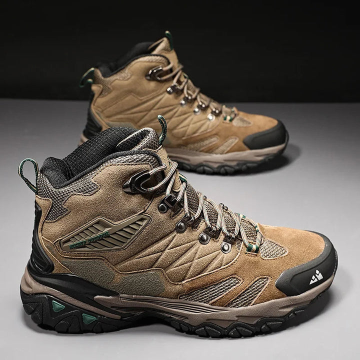 Comfortabele grijze heren waterdichte wandelschoenen, hoogmodel, voor avontuurlijke outdoor ervaringen.