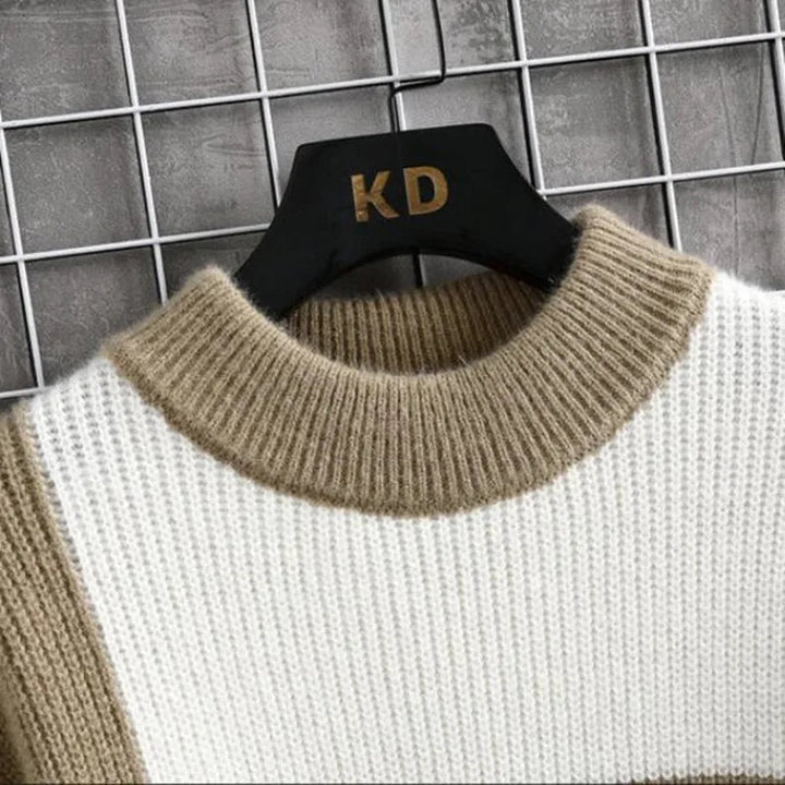 Trendsettende heren trui, geruit patroon en kleurvlakken in deze comfortabele pullover.