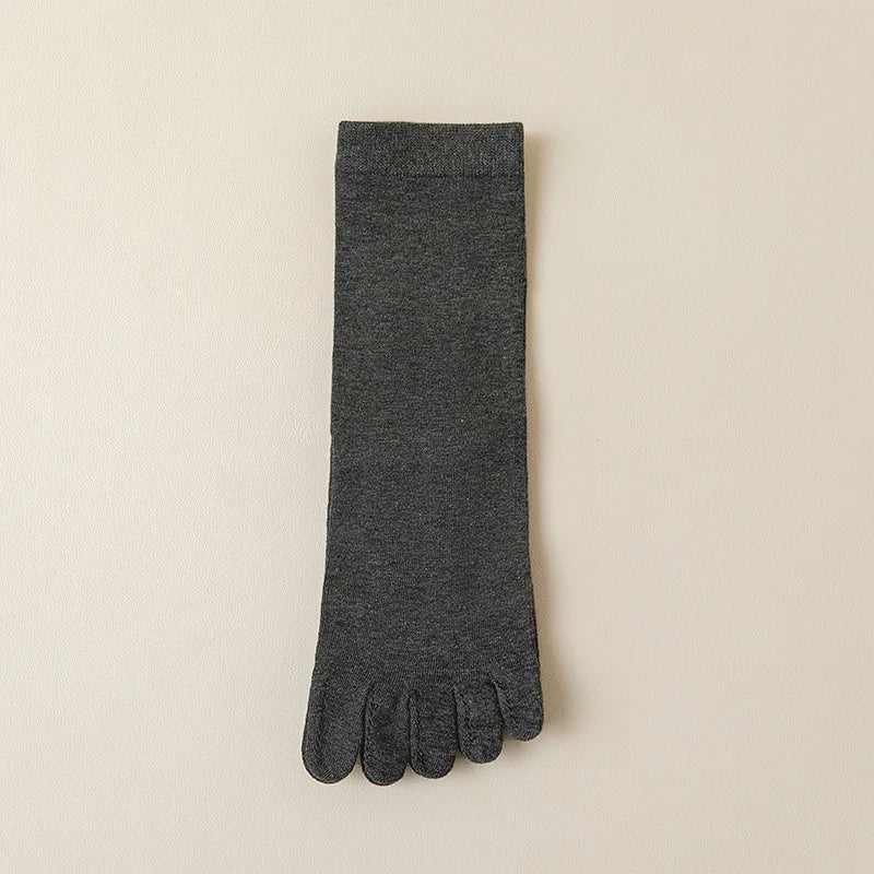 Warme dames teensokken, effen design, essentieel voor boots en comfort.