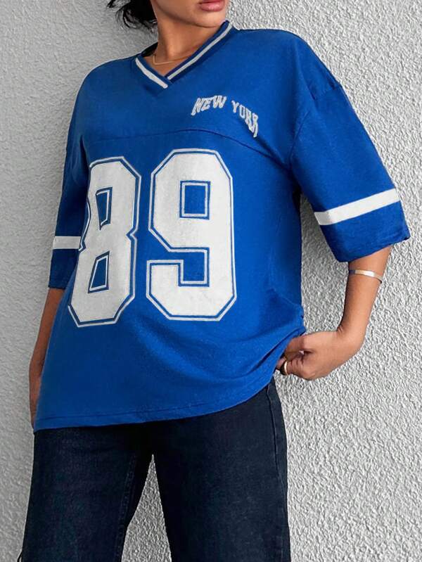 Dames oversized baseball shirt, zwart, met casual coole vibe voor een relaxte streetwear look.