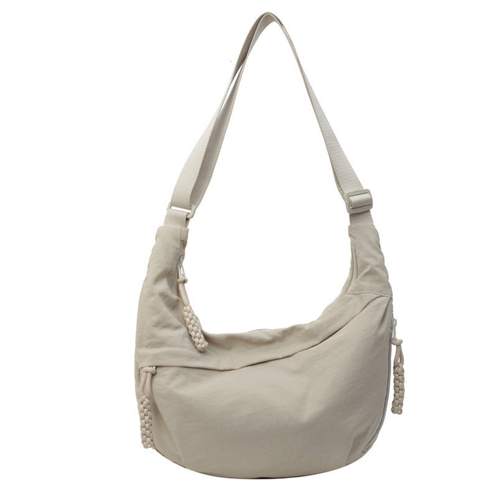 Comfortabele halvemaan crossbodytas voor dames. Nylon tas met verstelbare band, perfect als casual dagelijkse tas.
