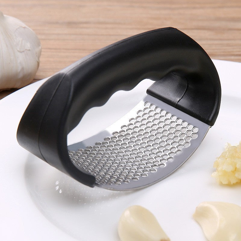 Elegante roestvrijstalen knoflookpers. Een duurzaam en onderhoudsvriendelijk kookaccessoire voor de moderne keuken.