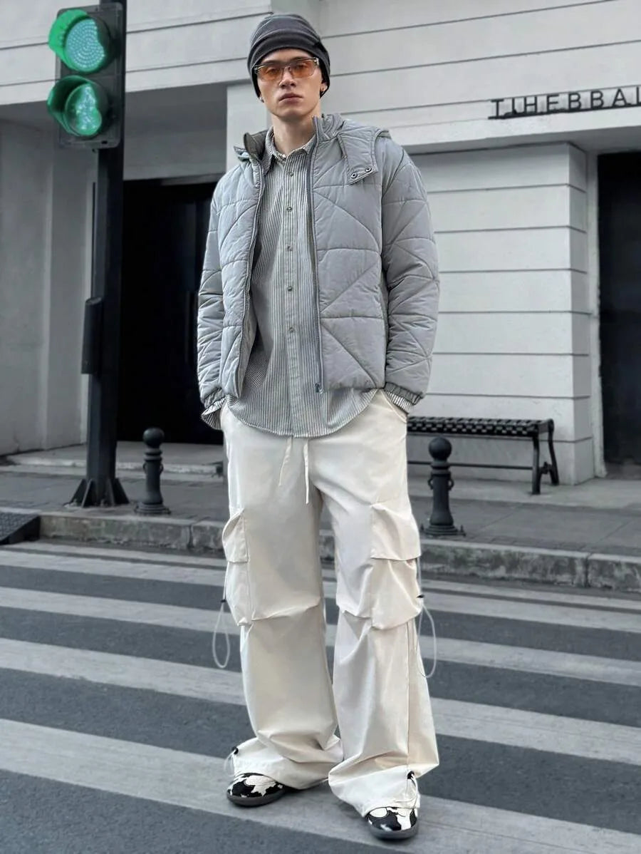 Stijlvol grijs heren pufferjack met capuchon. Stevige, comfortabele casual jas, perfect voor herfst & winter.